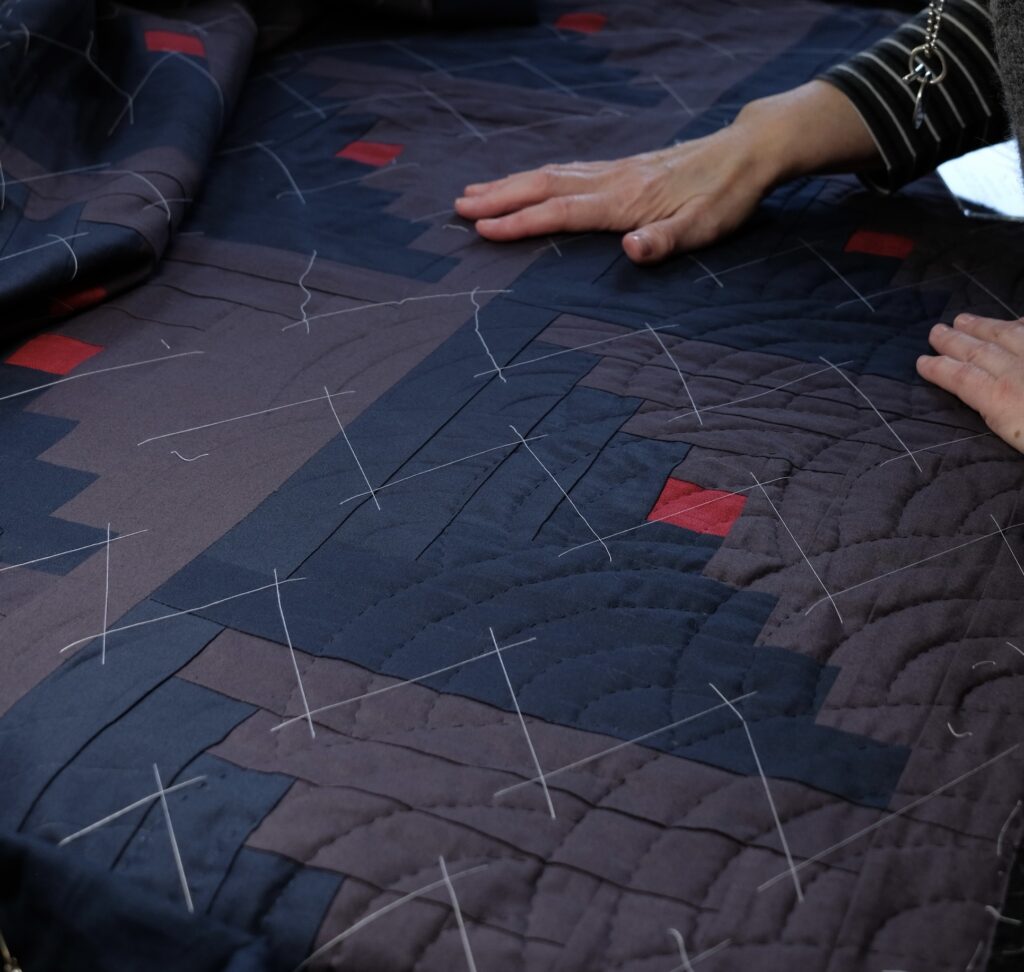 The slow process of hand quilting starts with the preparation